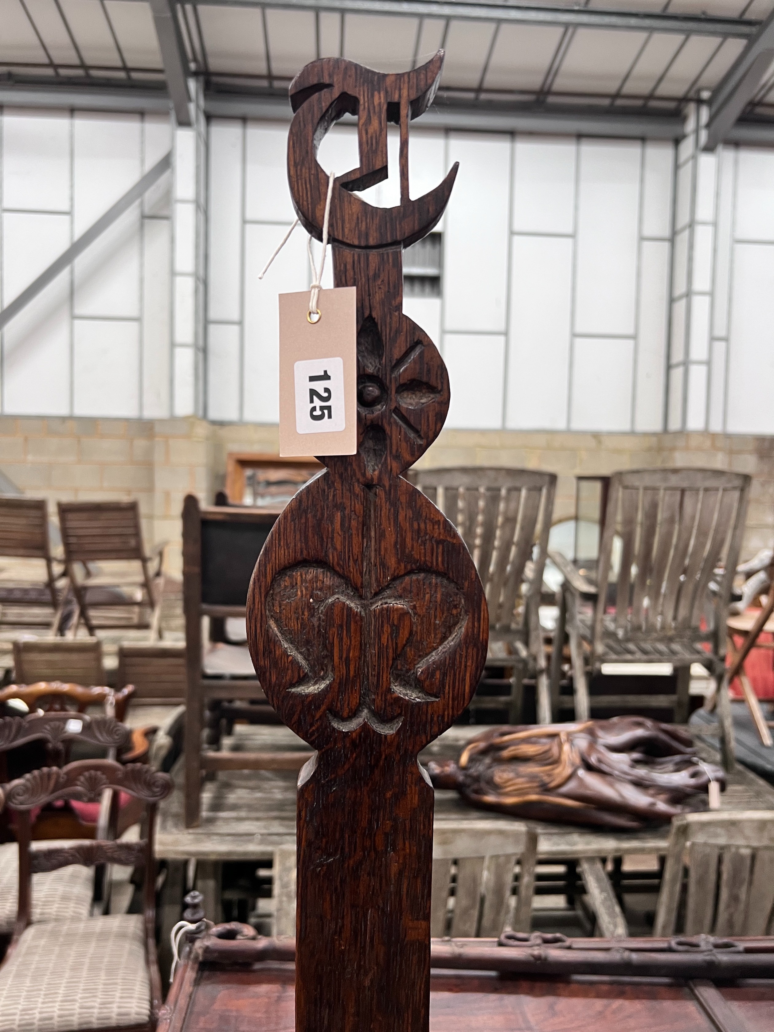 A carved oak spinning chair, height 82cm *Please note the sale commences at 9am.